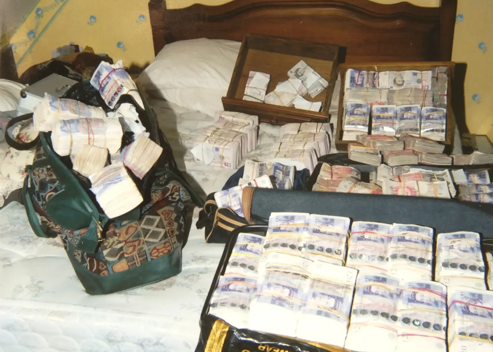 Bundles of banknotes recovered by West Midlands Police